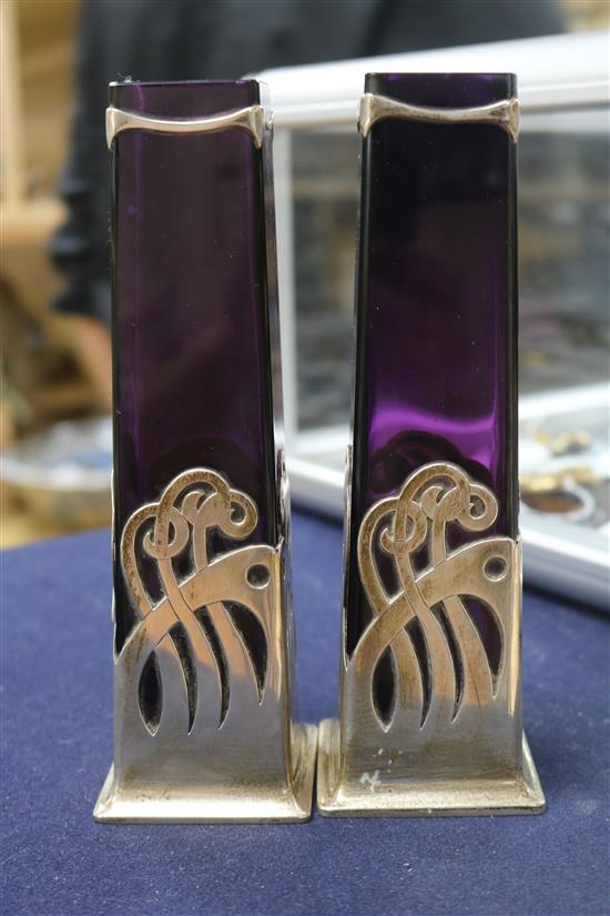 A pair of Austro Hungarian Art Nouveau 800 standard white metal mounted amethyst glass vases.